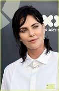 charlize-theron-debuts-black-hair-at-her-charity-event-21.jpg