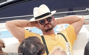 46377557-9869887-Happy_The_star_appeared_happy_while_reclining_on_deck-a-9_1628275844255.jpg