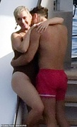 46201651-9853621-Saucy_Orlando_kissed_her_neck_while_she_popped_her_knee-a-87_1627934405993.jpg