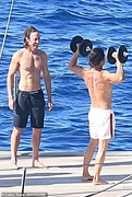 61616019-11135095-Shirtless_He_showed_off_his_physique_as_he_lifted_weights_while_-m-38_1661186856959.jpg