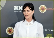 charlize-theron-debuts-black-hair-at-her-charity-event-24.jpg