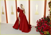 cara-delevingne-red-gown-2023-oscars-05.jpg