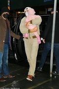 53502953-10453857-Dad_duty_Their_baby_girl_was_in_pink_from_head_to_toe_wearing_a_-a-3_1643411365291.jpg