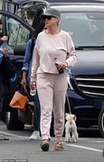 46377565-9869887-Sandals_The_star_teamed_her_low_key_look_with_a_pair_of_comfy_op-a-11_1628275845027.jpg