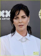 charlize-theron-debuts-black-hair-at-her-charity-event-12.jpg