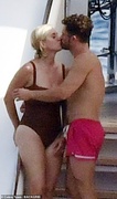 46201665-9853621-Sweet_The_pair_took_every_opportunity_to_kiss_and_cuddle-a-79_1627934405946.jpg