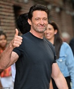 45542131-9796887-Back_to_business_Hugh_Jackman_shows_off_his_bulging_biceps_and_f-a-1_1626479715382.jpg