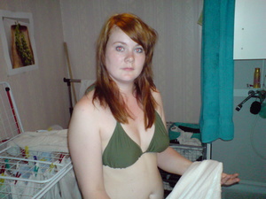 Redhead Babe shows her Pussy